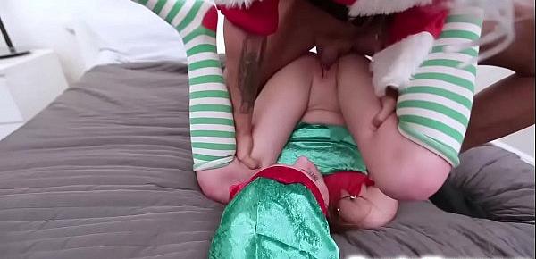  Sexy teen Lizzie Bell enjoys fucking with Santa